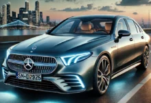 2025 Mercedes-Benz E-Class parked on a scenic road with a sleek design, LED headlights, and a modern city skyline in the background.