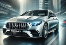 2025 Mercedes-AMG E53 sedan in motion with AMG grille and LED headlights.